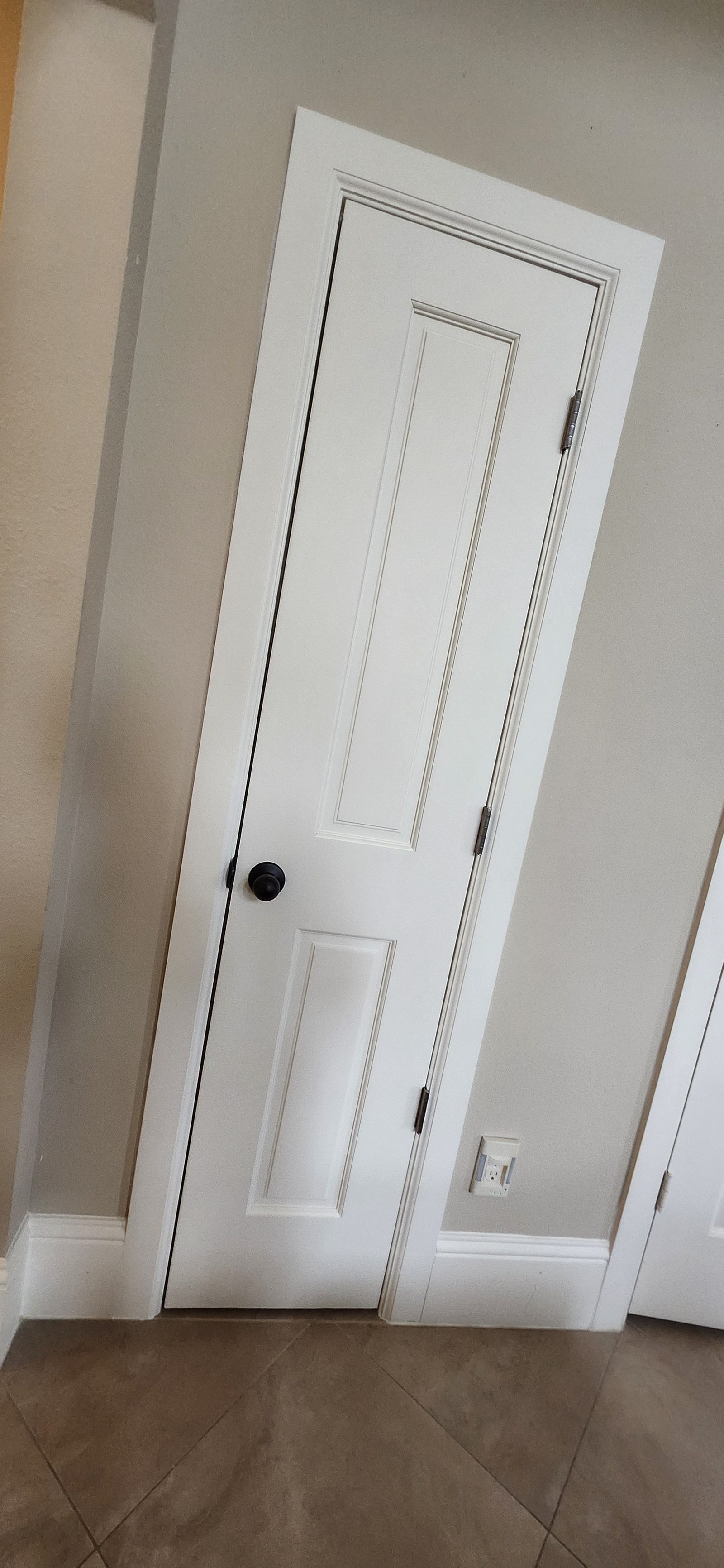 New closet door installed after opening up dead wall space in Katy, TX
