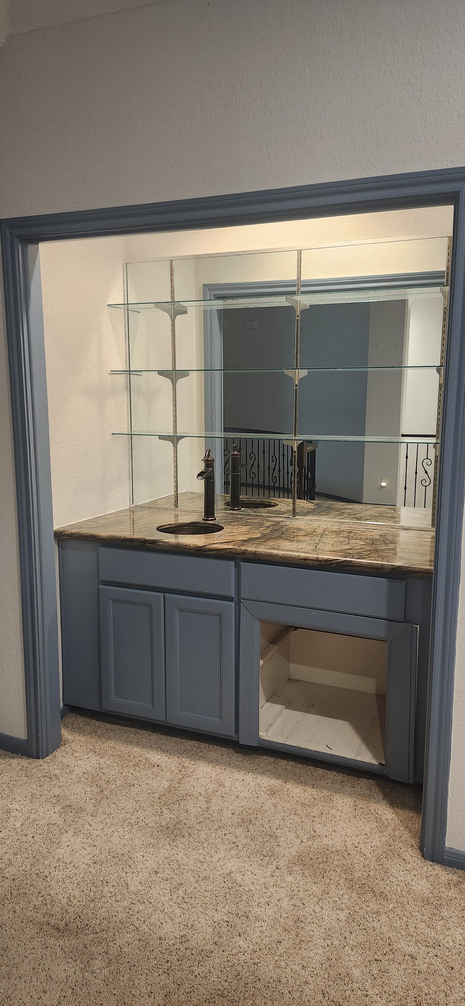 Wet bar area before remodel in Katy, TX