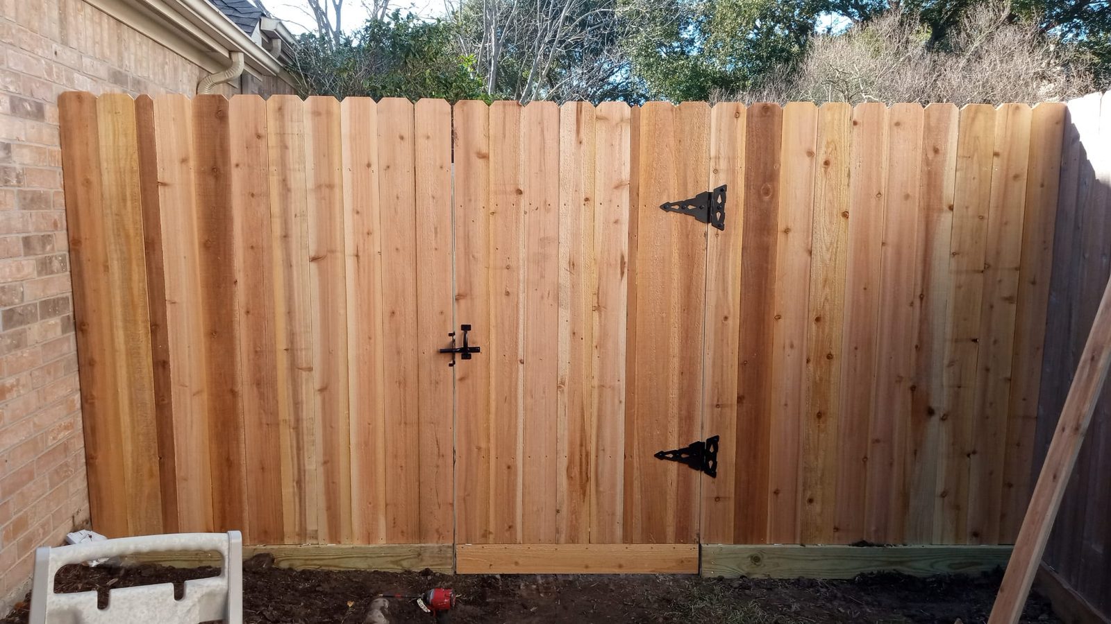 Cedar fence gate repaired and rebuilt in Katy, TX