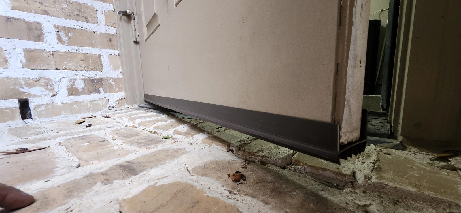 New bottom door weather seal installed after replacement in Katy, TX
