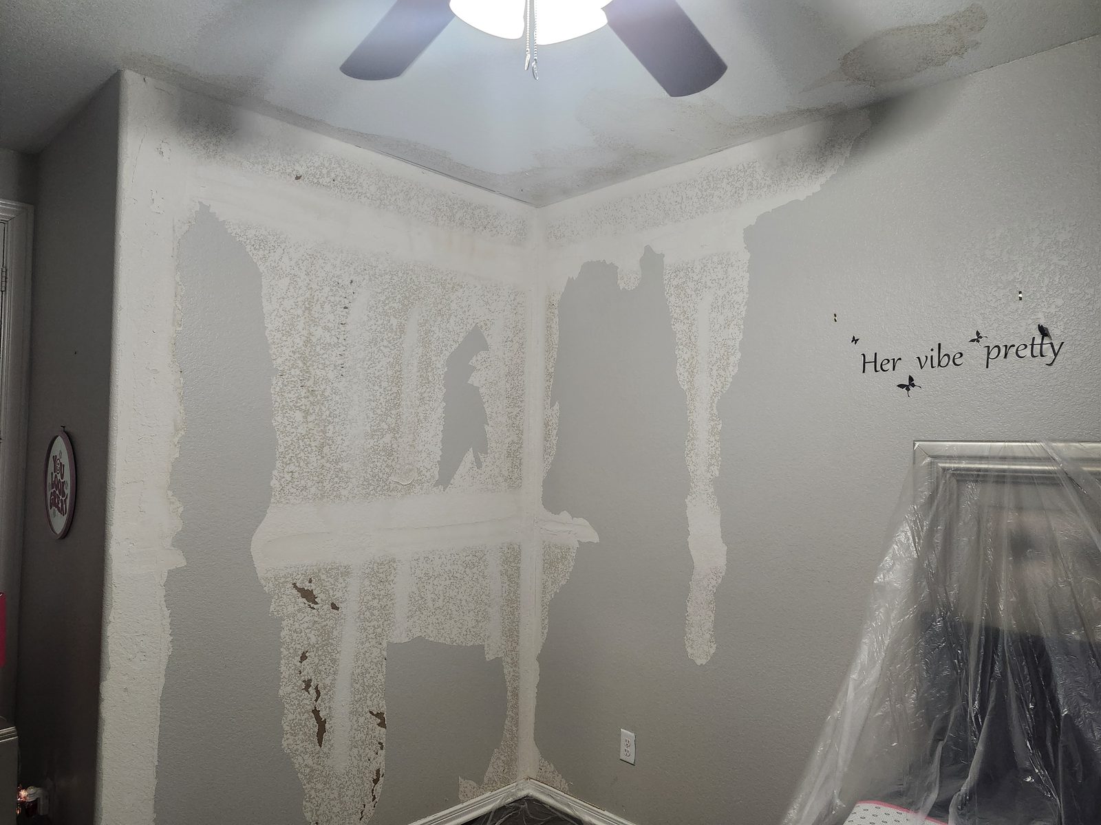 Damaged wall texture before drywall repair in Katy, TX