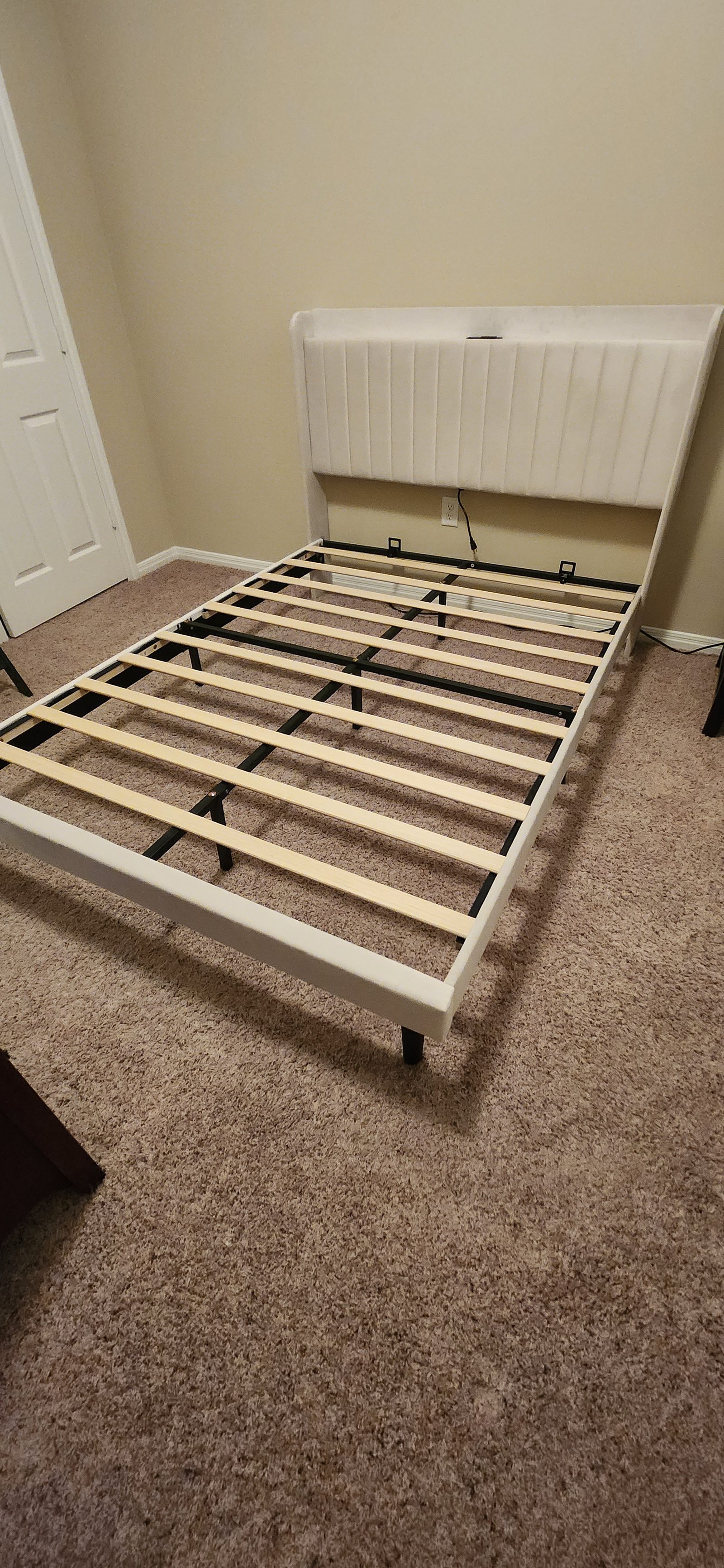 Assembled upholstered bed frame with headboard in Katy, TX