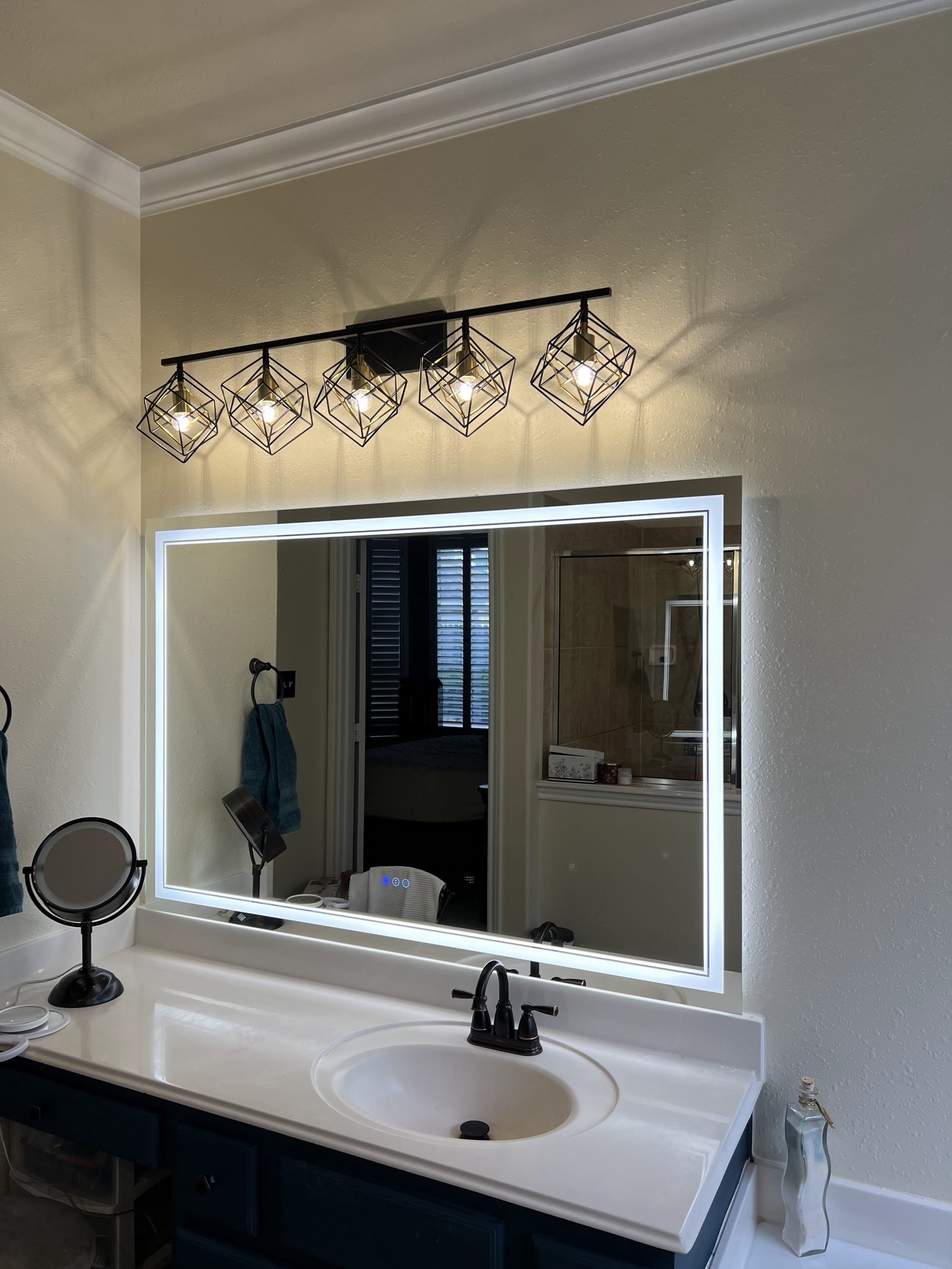 Bathroom vanity light and mirror installed in Katy, TX